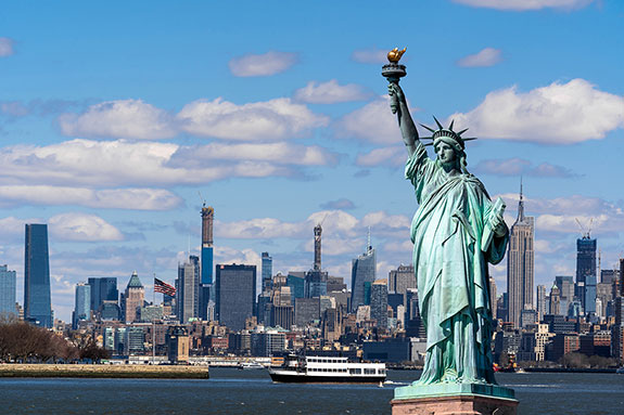 Statue of Liberty and Manhattan skyline representing USRC's New York platform.